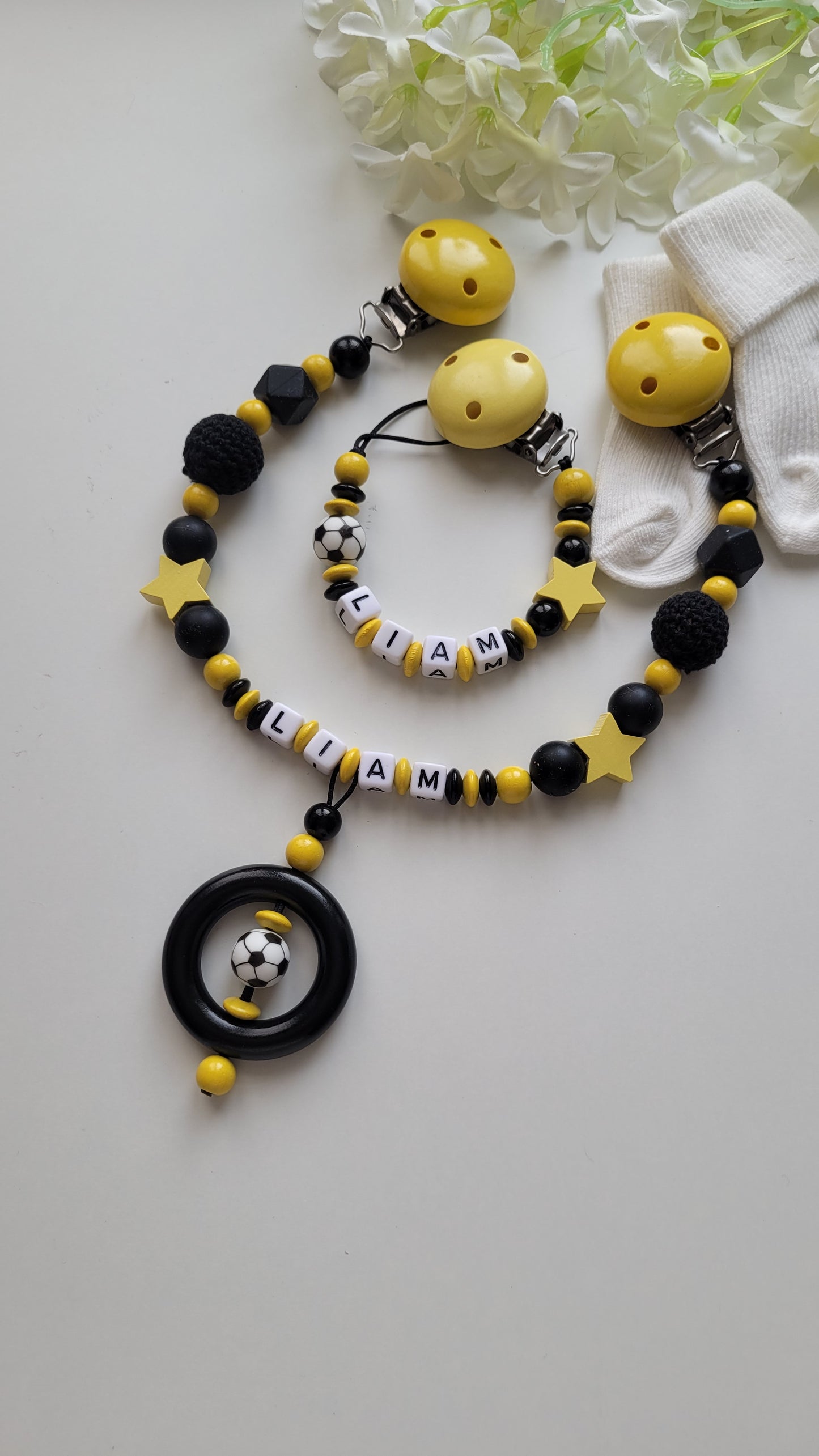 Kinderwagenkette & Schnullerkette  Fussball schwarz gelb