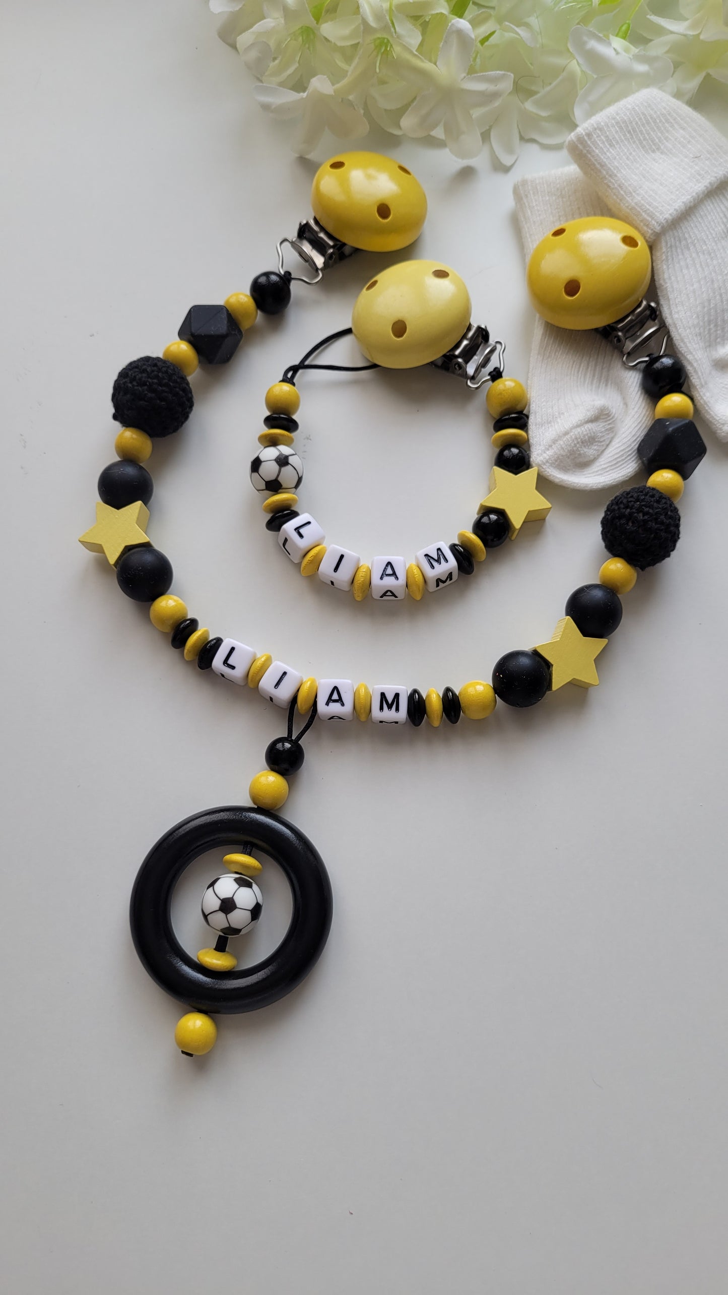 Kinderwagenkette & Schnullerkette  Fussball schwarz gelb