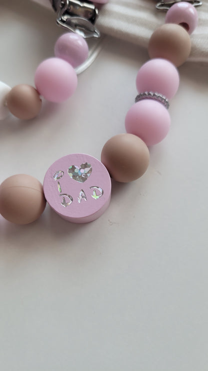Kinderwagenkette & Schnullerkette mit Namen Pferd & i love Mom und Dad rosa weiss