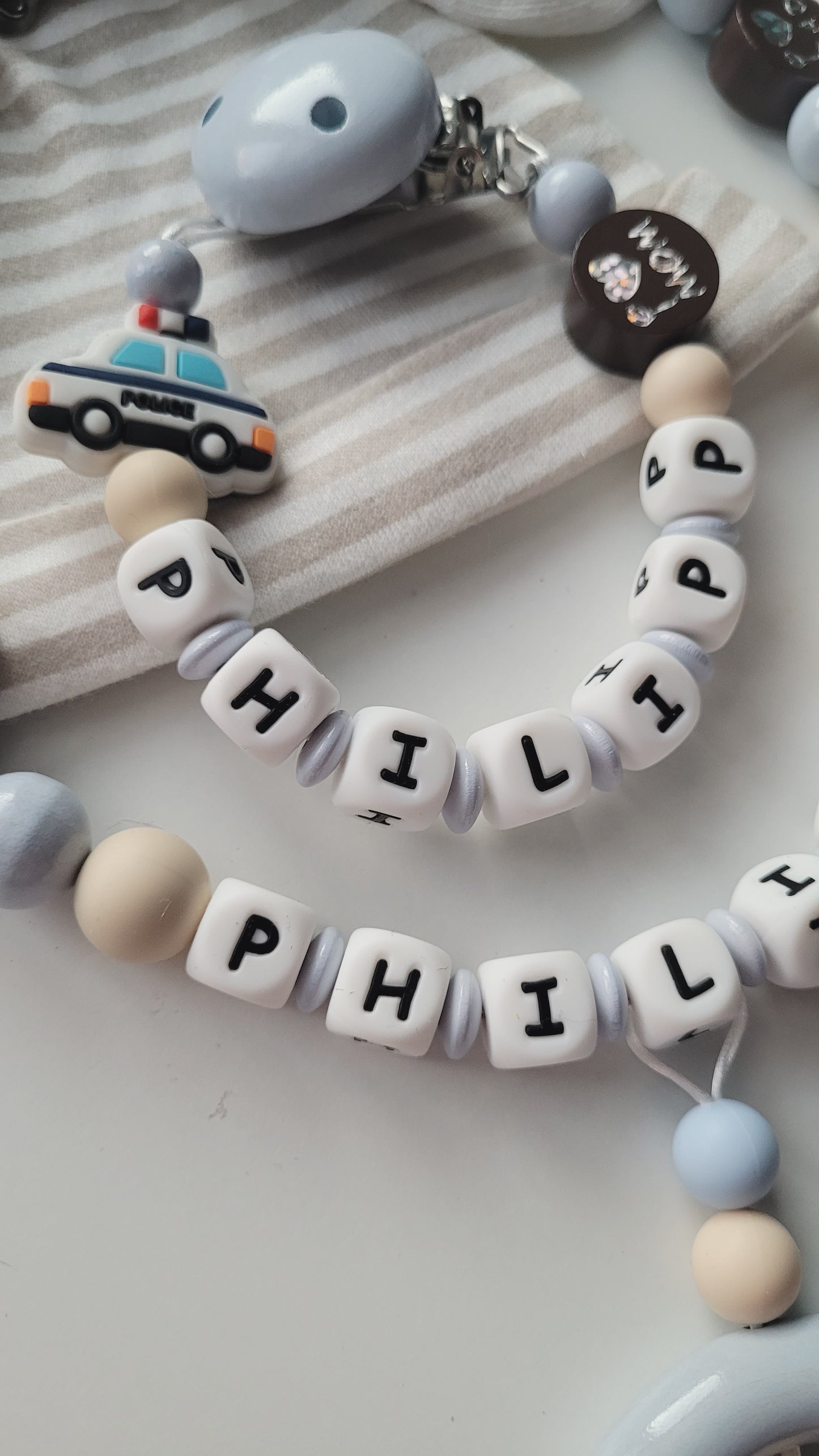 Kinderwagenkette & Schnullerkette mit Namen Polizei beige braun grau blau