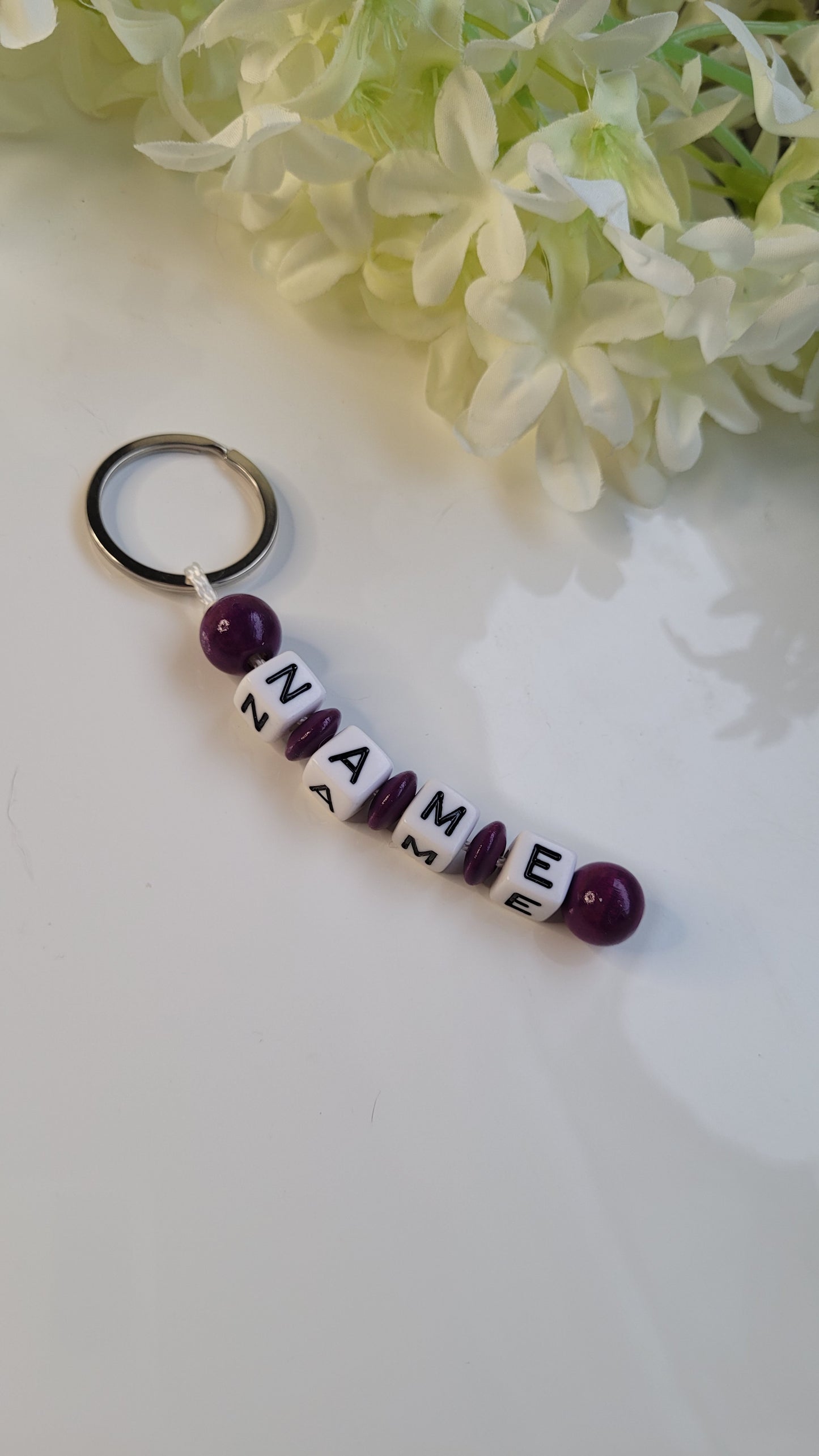 Schlüsselanhänger mit Namen pflaume