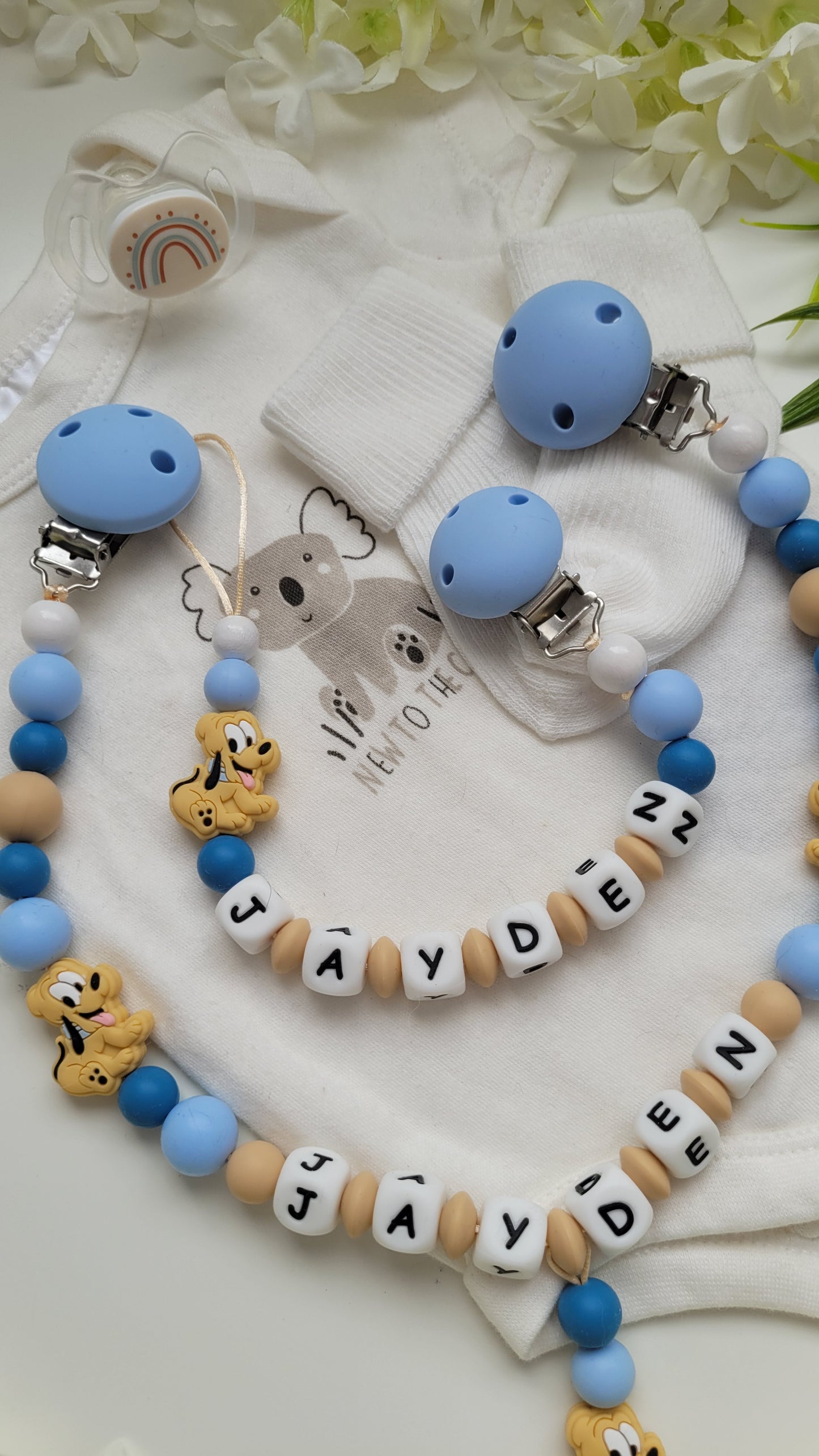 Kinderwagenkette & Schnullerkette mit Namen für Jungen Hund blau gelb