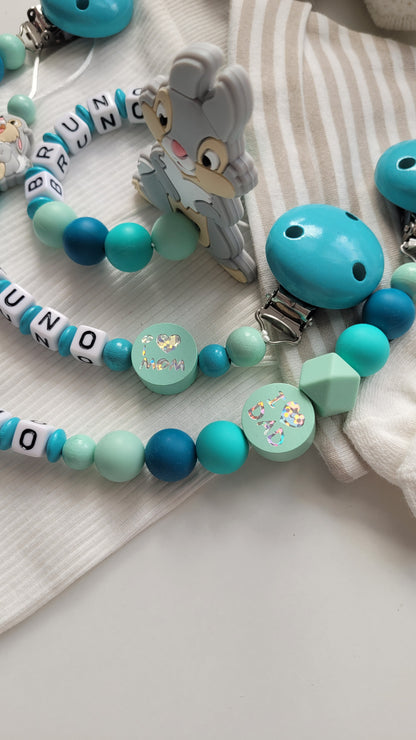 3tlg Schnullerkette Kinderwagenkette Greifring mit Namen Hase & i love Mom und Dad mint türkis