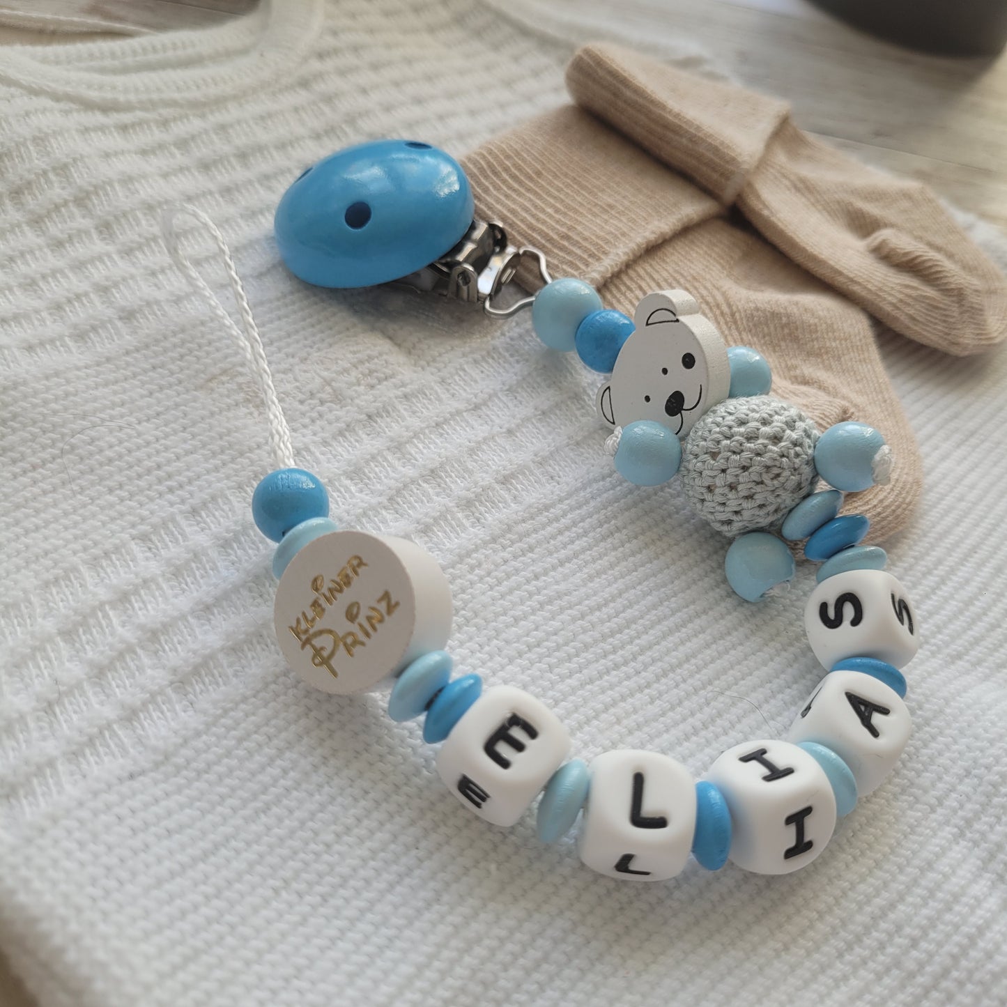 Schnullerkette mit Namen für Jungen Teddy & kleiner Prinz blau hellblau