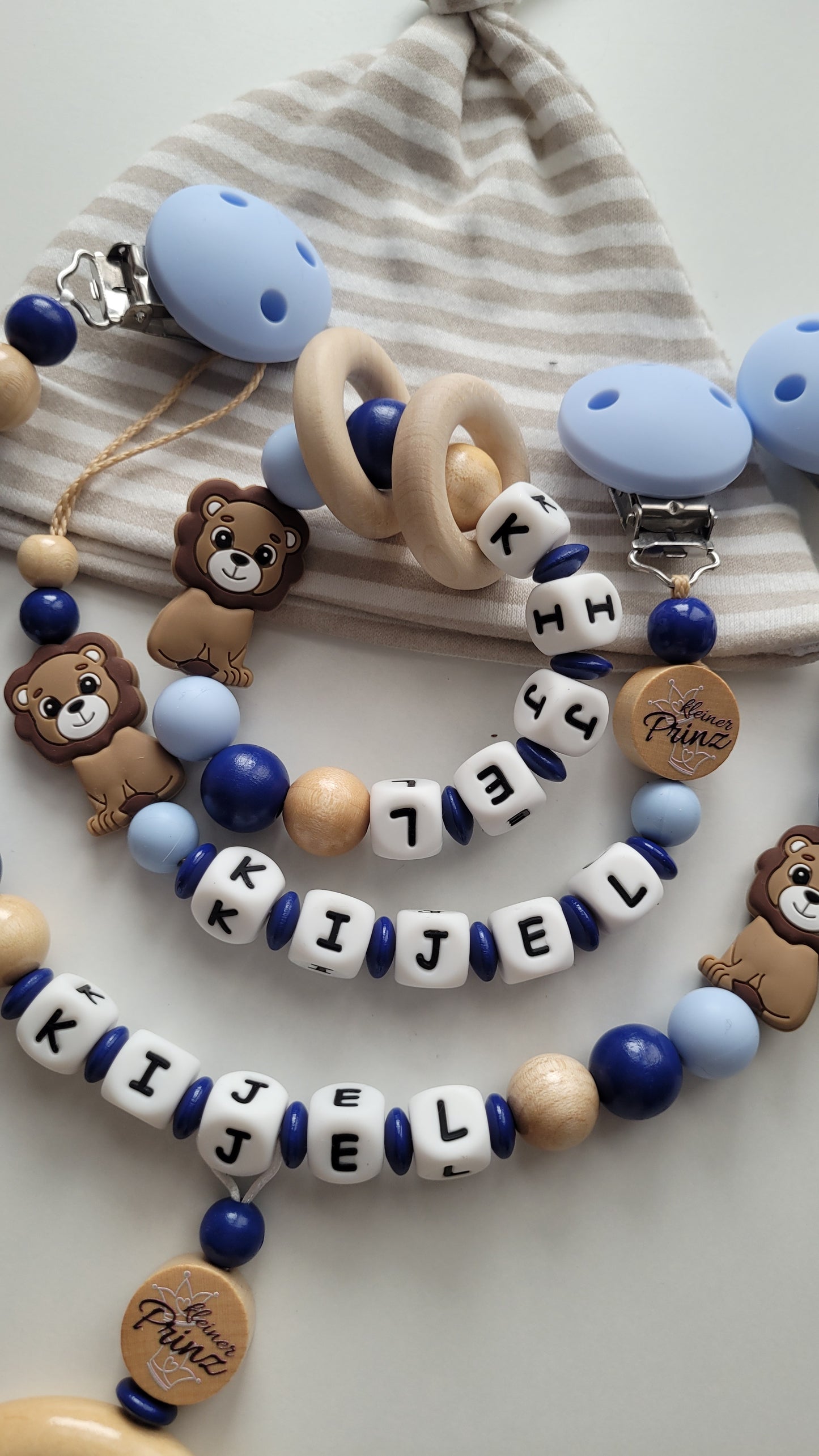 Schnullerkette Kinderwagenkette Greifling Löwe blau dunkelblau holz
