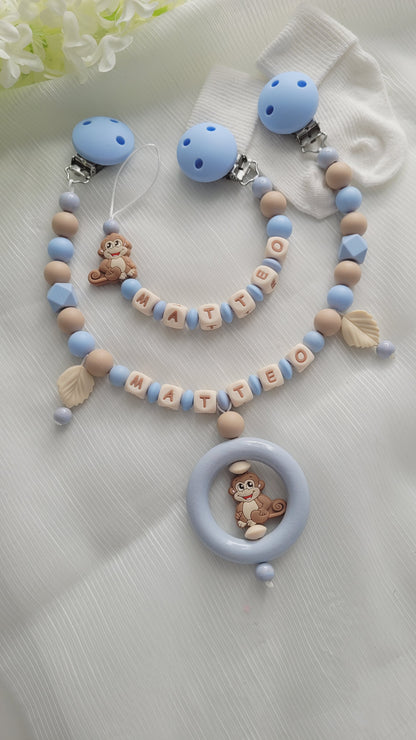 Kinderwagenkette & Schnullerkette mit Namen Äffchen blau beige silikon