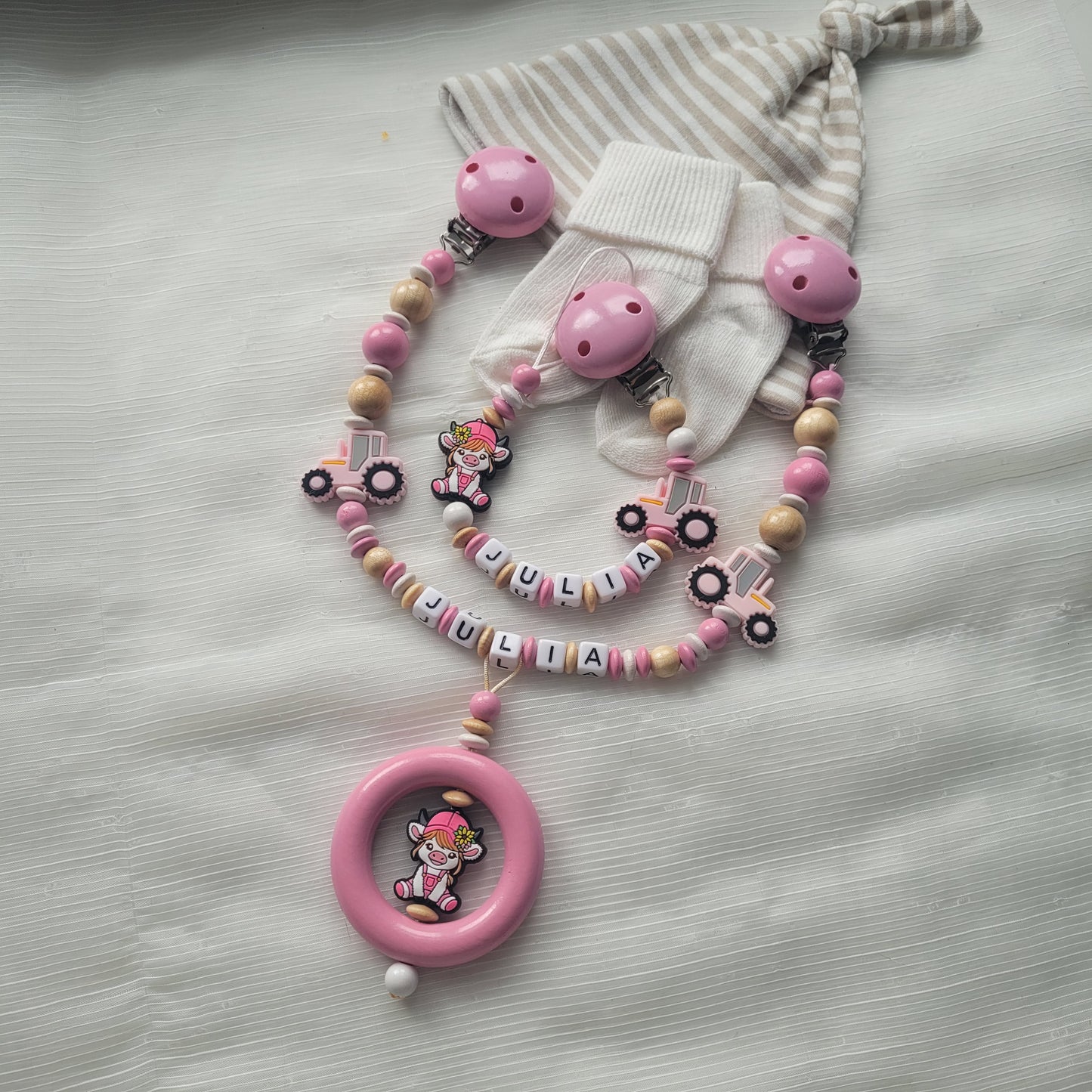 Kinderwagenkette & Schnullerkette mit Namen  Bauernhof Traktor & Kuh rosa holz