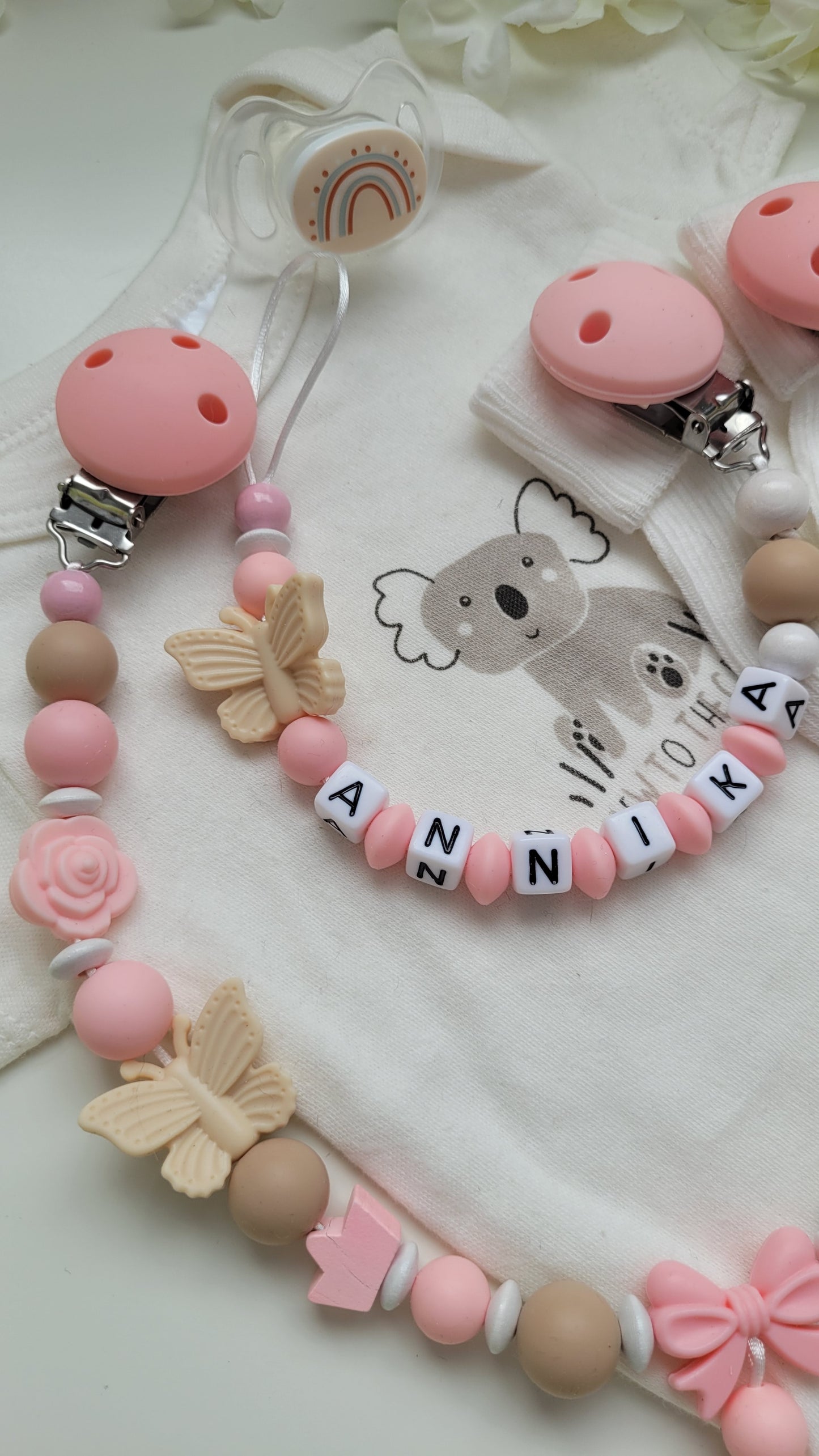 Kinderwagenkette & Schnullerkette *Schmetterling* beige apricot