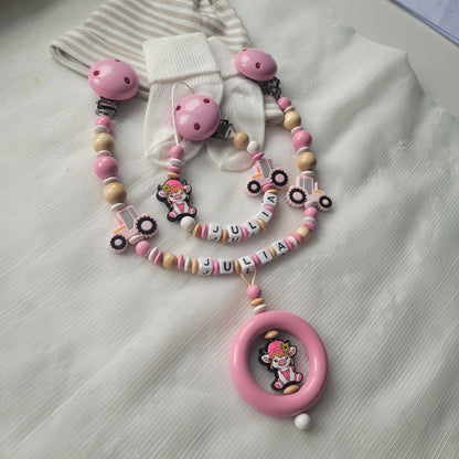 Kinderwagenkette & Schnullerkette mit Namen  Bauernhof Traktor & Kuh rosa holz