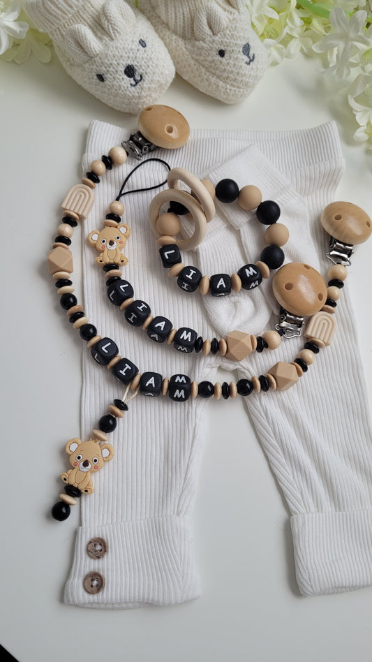 3 tlg Set Schnullerkette Kinderwagenkette Greifring Koalabärchen  Schwarz beige