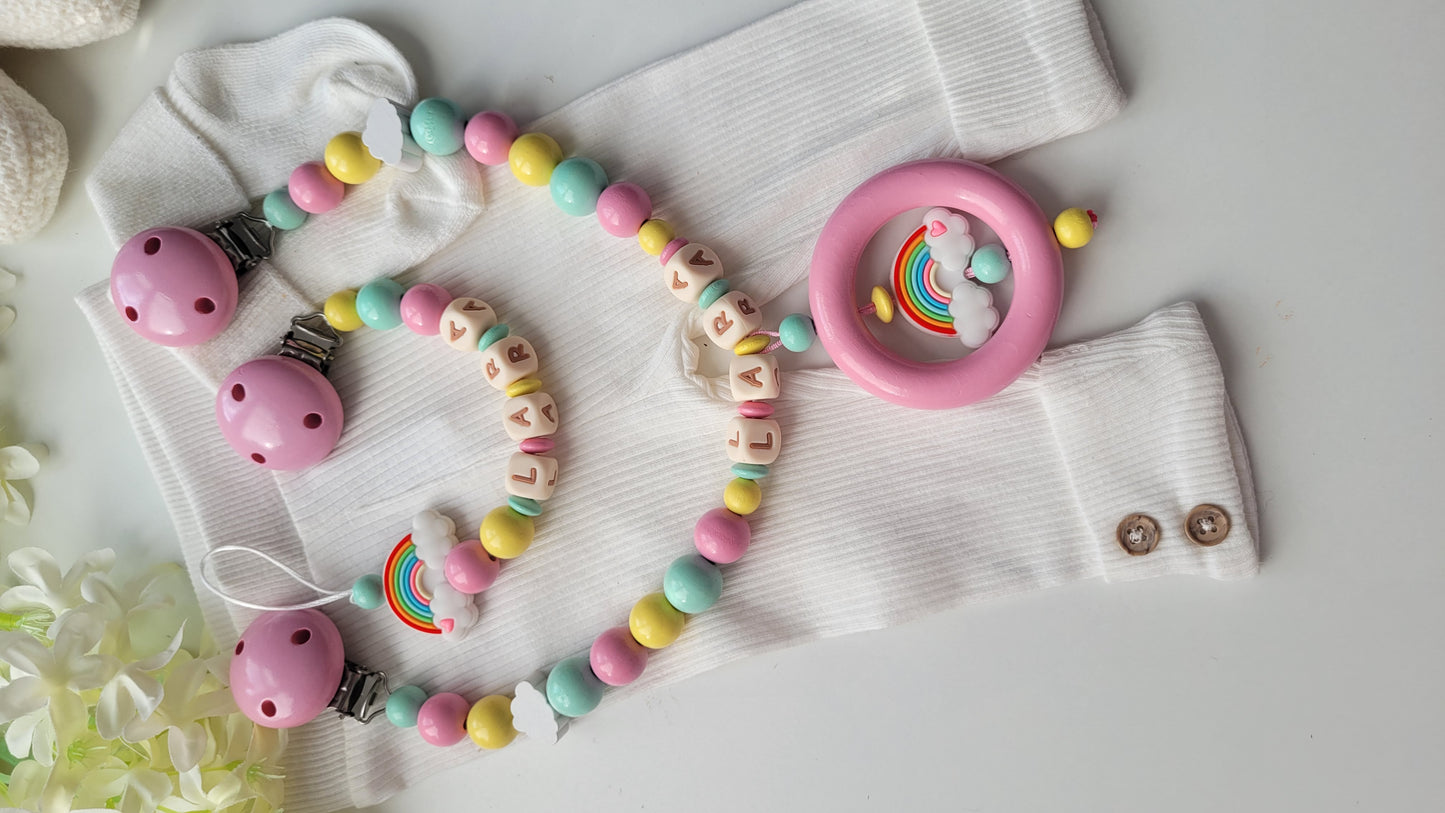 3er Set Schnullerkette, Kinderwagenkette & Greifring Regenbogen Pastellfarben