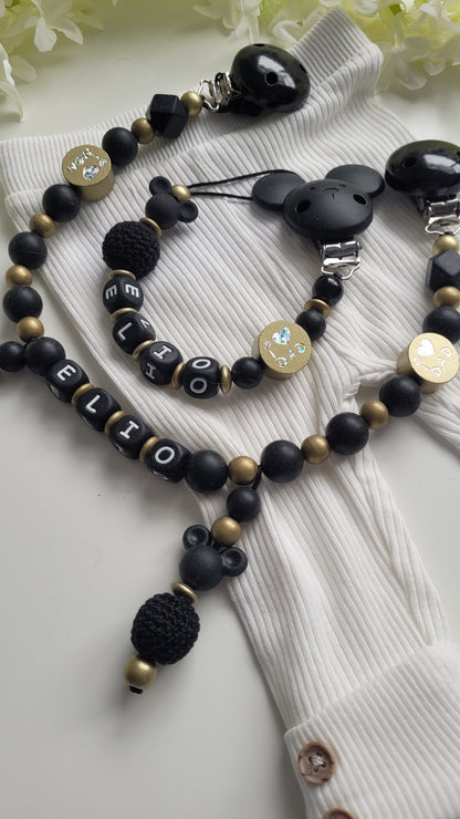 Kinderwagenkette & Schnullerkette mit Namen schwarz gold