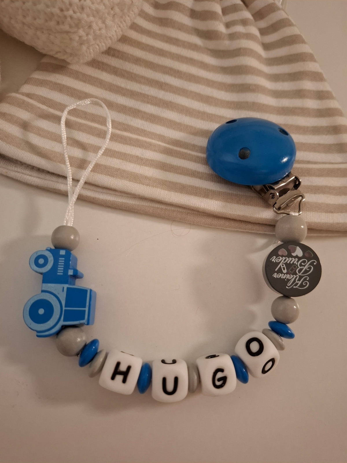 Schnullerkette mit Namen für Jungen Traktor blau grau