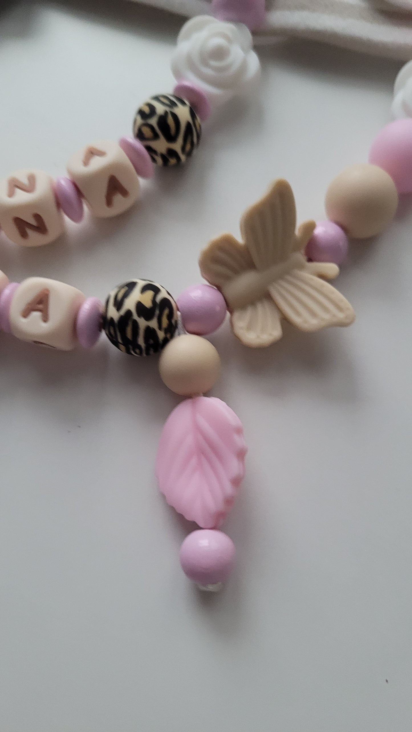 Kinderwagenkette & Schnullerkette mit Namen Minnie Maus Rosen leo