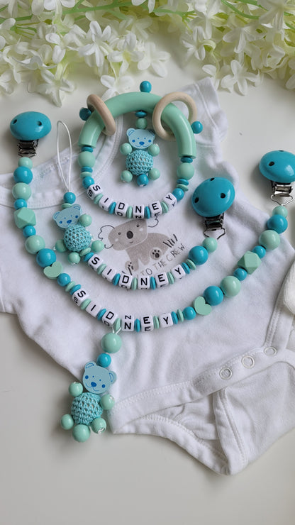 3tlg.Set Schnullerkette Kinderwagenkette & Greifring Teddy türkis