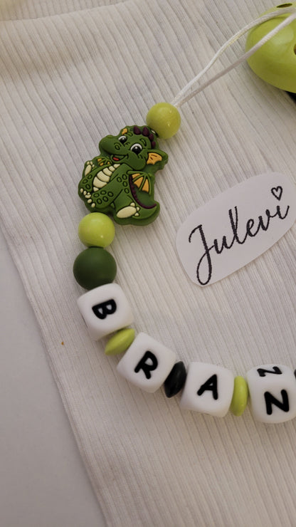 Schnullerkette mit Namen für Jungen Drache grün