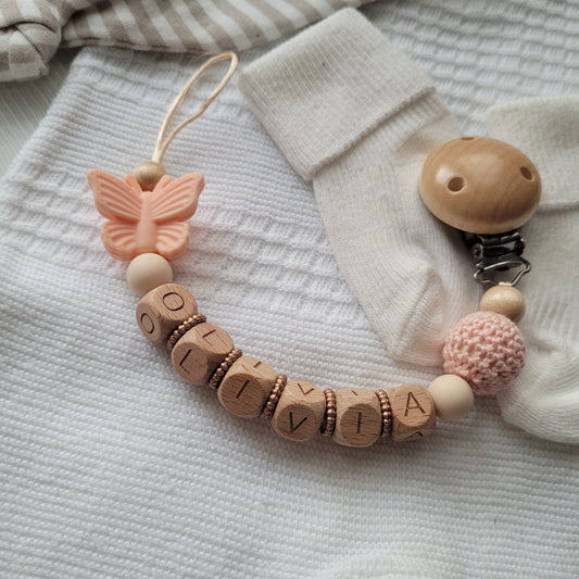 Schnullerkette mit Namen für Mädchen Schmetterling apricot beige