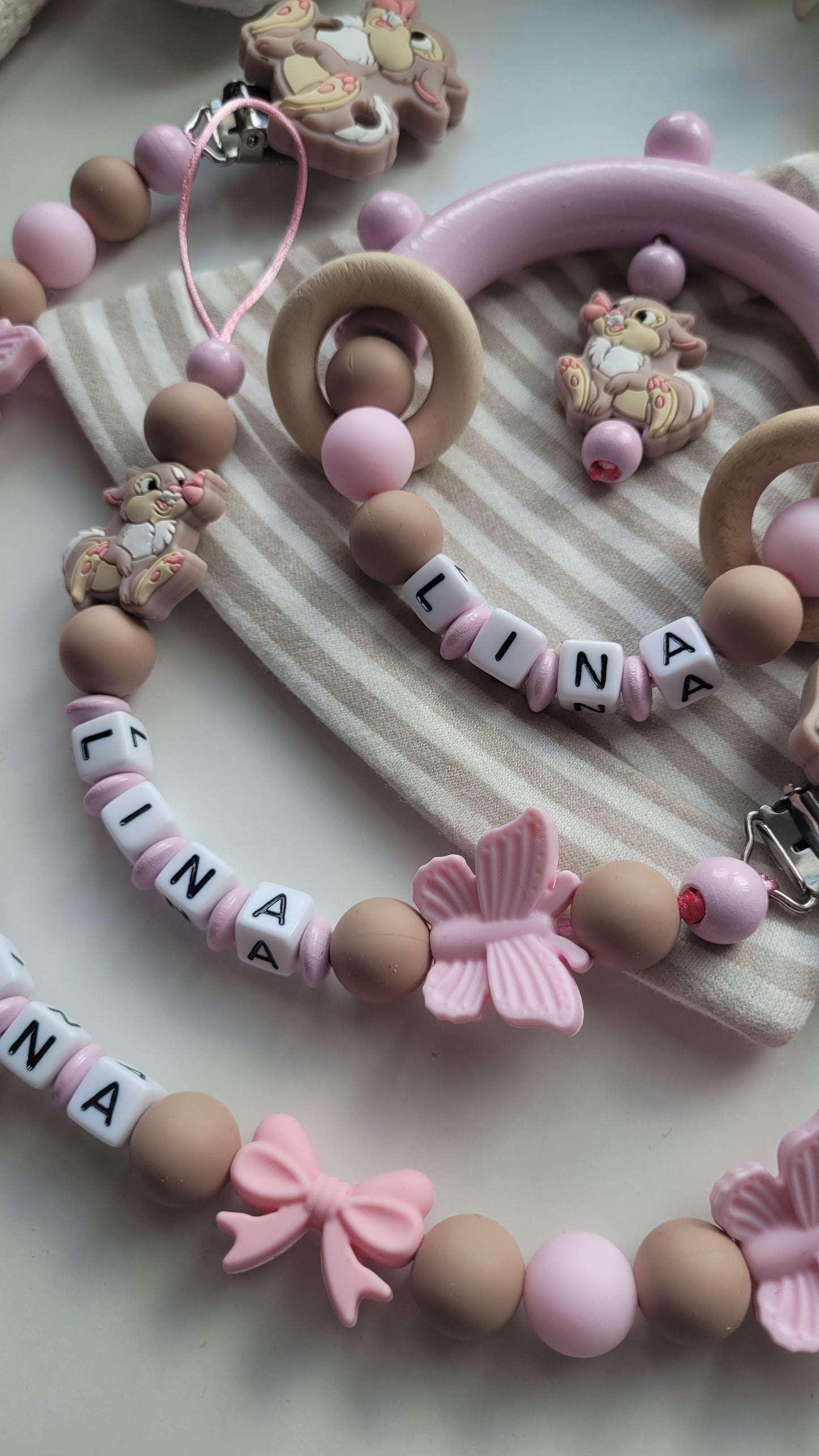 3tlg.Set Schnullerkette Kinderwagenkette & Greifring Hase Schmetterling rosa taupe