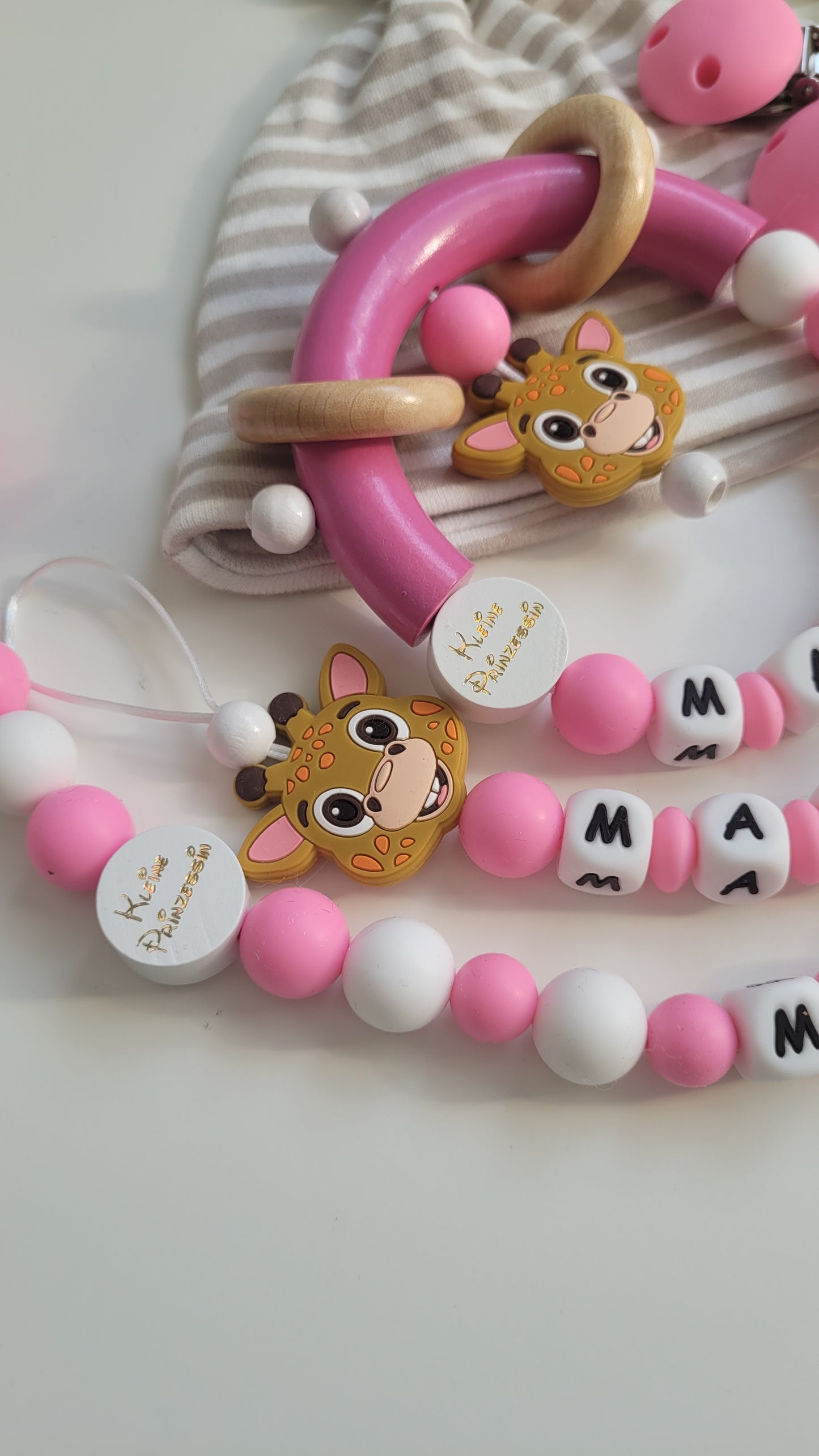 3tlg.Set Schnullerkette Kinderwagenkette & Greifring Giraffe pink