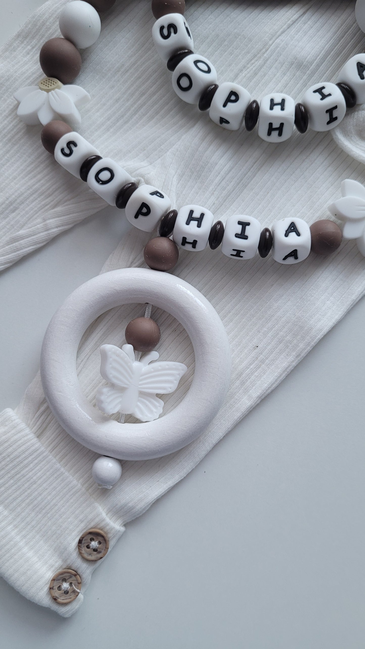 Kinderwagenkette & Schnullerkette mit Namen  Schmetterling Braun weiß