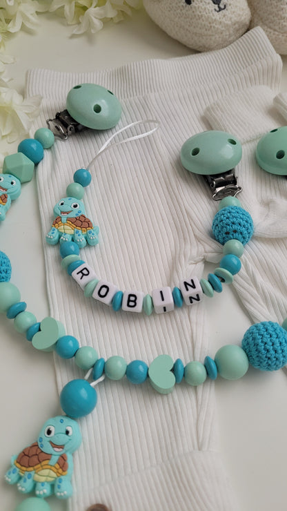 Kinderwagenkette & Schnullerkette mit Namen Schildkröte mint türkis