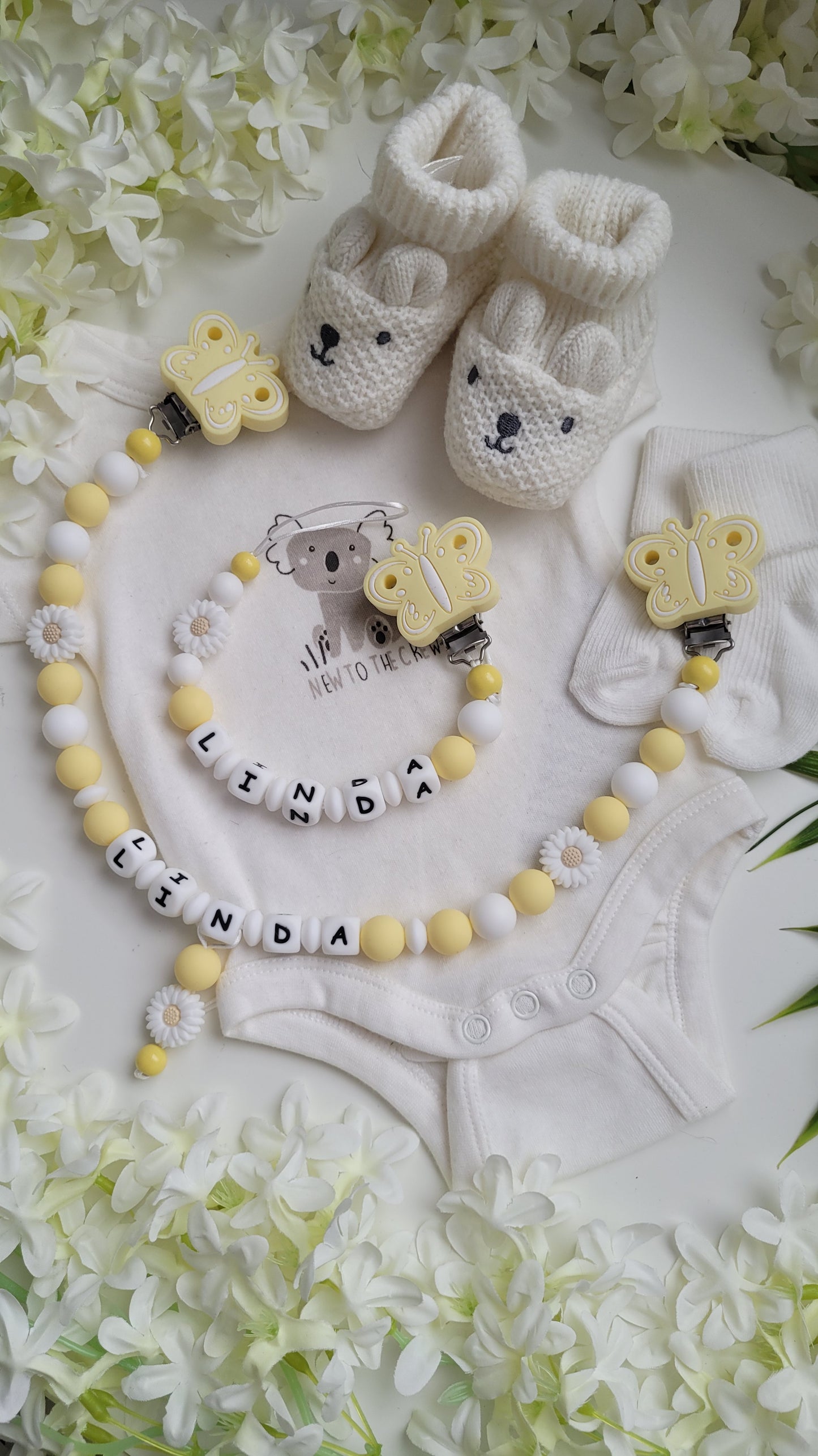 Kinderwagenkette & Schnullerkette mit Namen Gänseblümchen