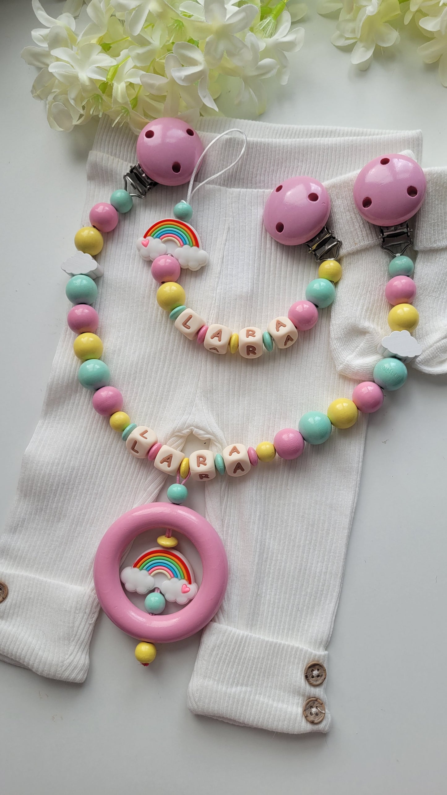 Kinderwagenkette & Schnullerkette Regenbogen Pastell