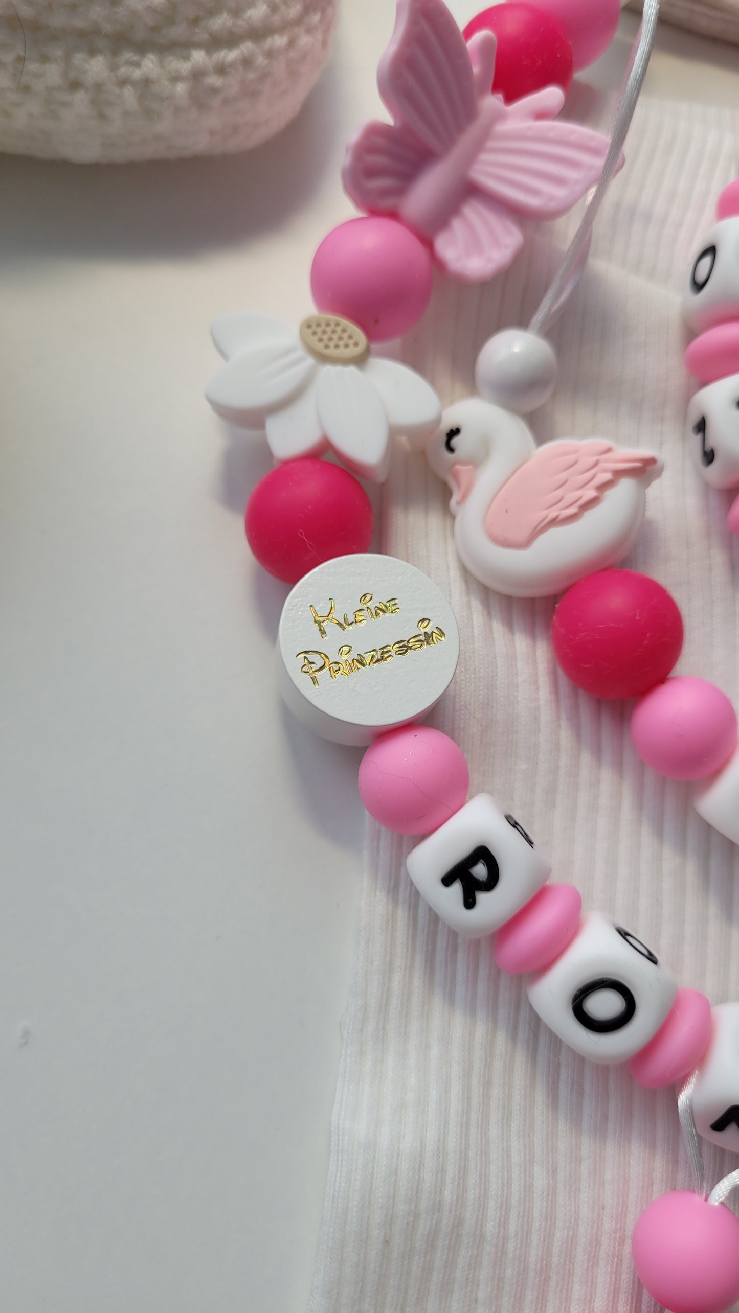 3er Set Schnullerkette Kinderwagenkette & Greifring Schwan & Blumen pink