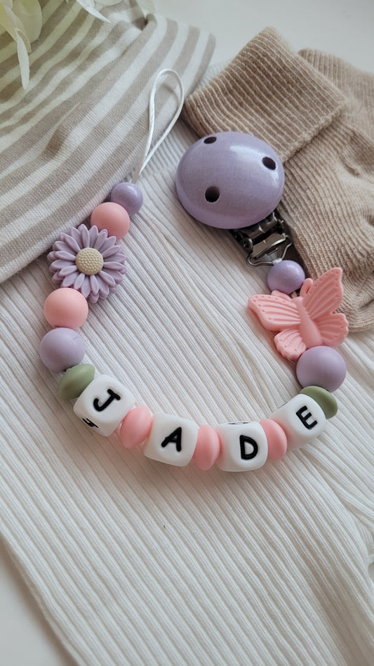 Schnullerkette mit Namen für Mädchen Schmetterling flieder rosa grün