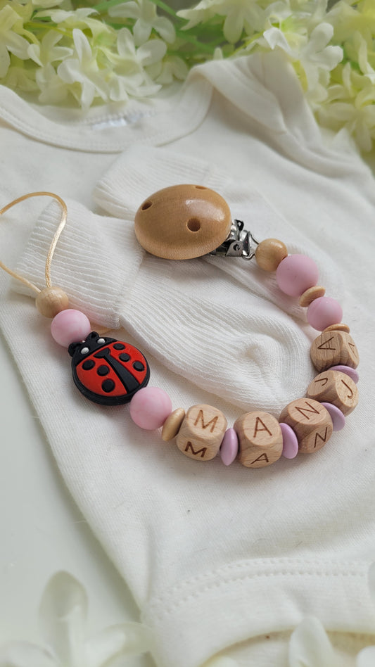 Schnullerkette mit Namen Marienkäfer rosa holz