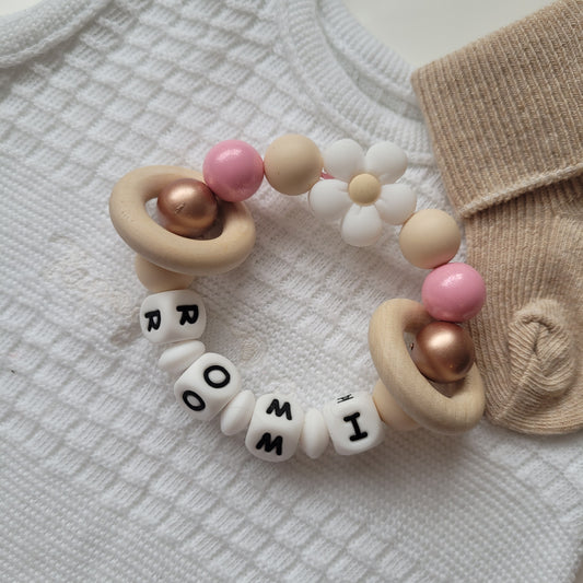 Motorik Greifring mit Namen Blume schimmer rose gold weiss beige