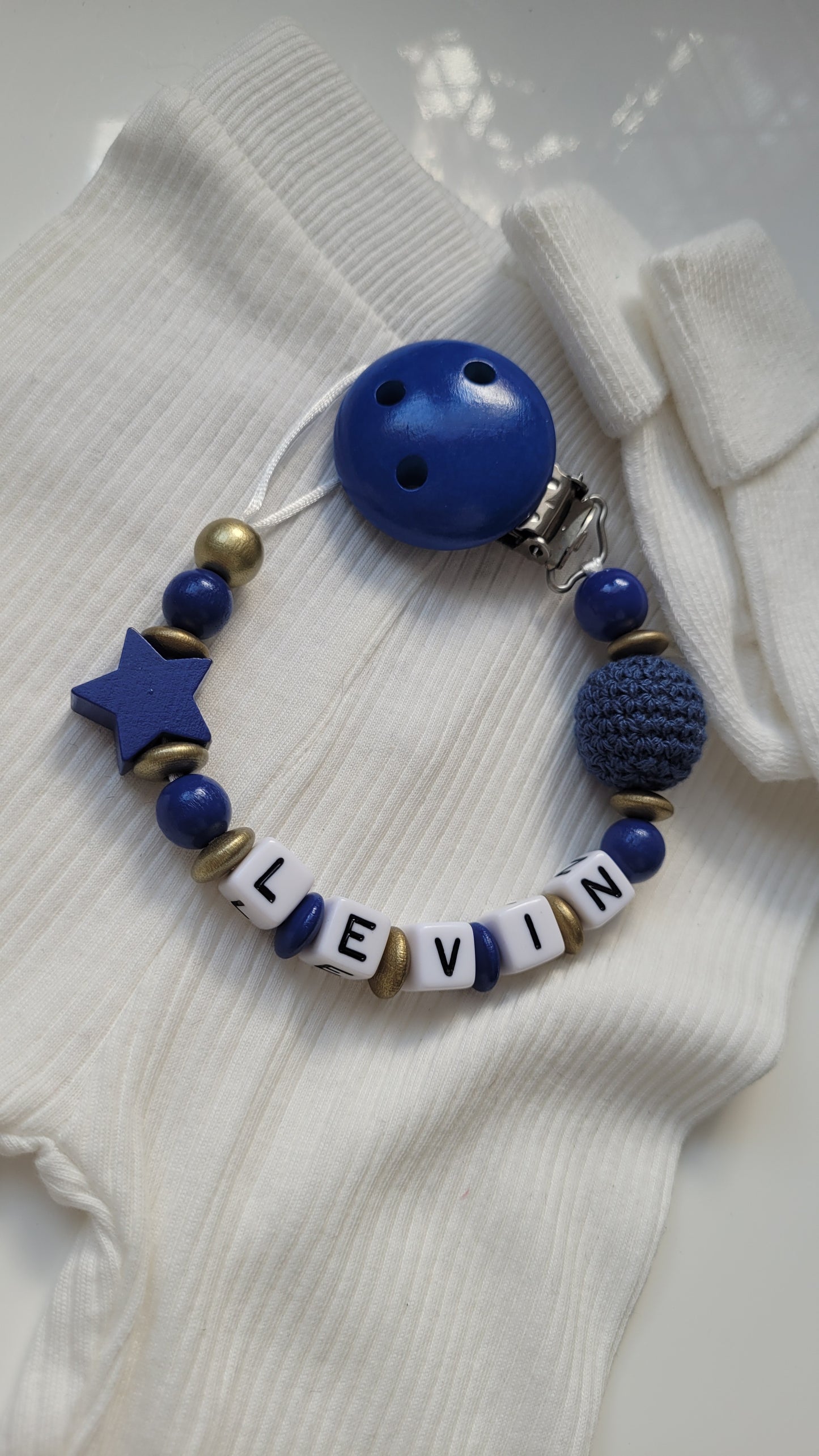 Schnullerkette mit Namen Sternchen blau gold