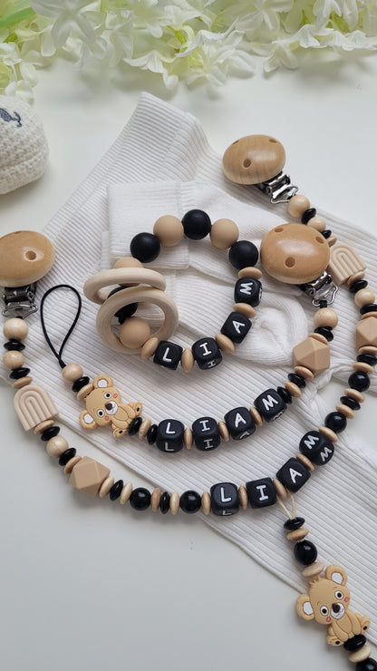 3 tlg Set Schnullerkette Kinderwagenkette Greifring Koalabärchen  Schwarz beige